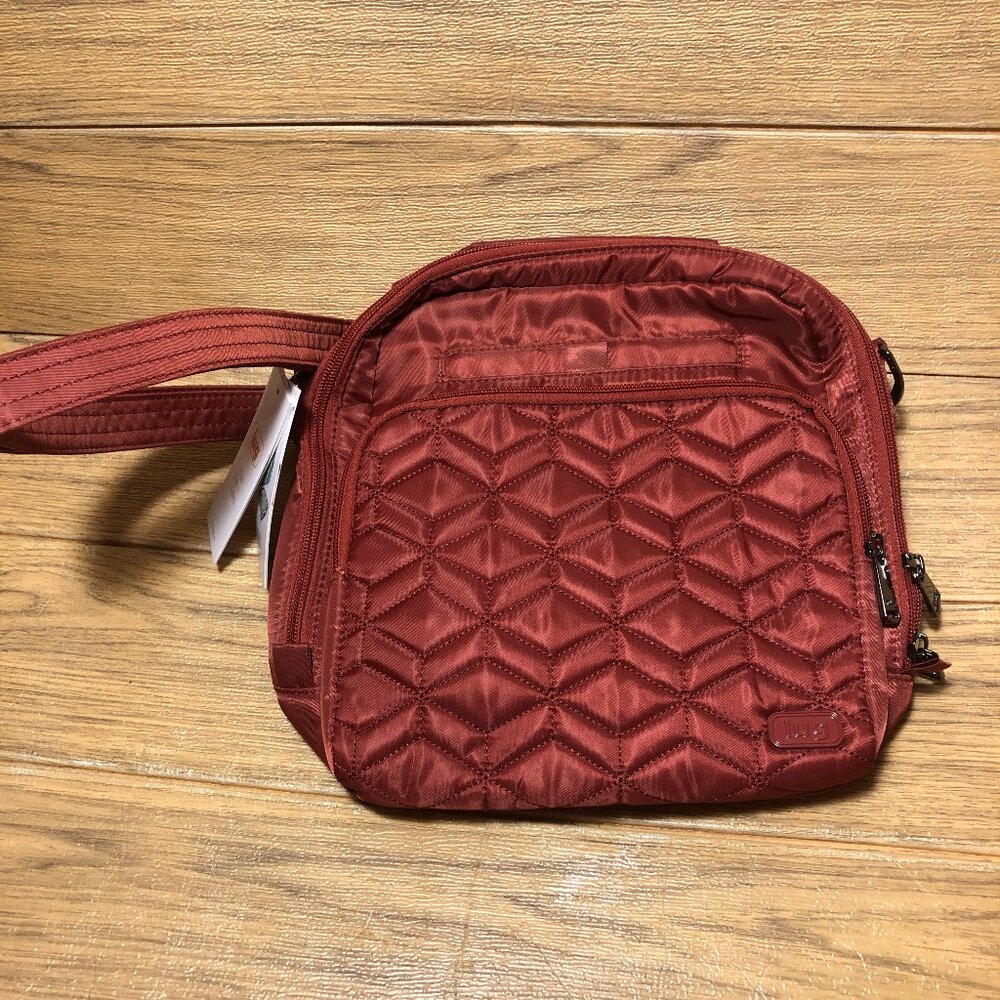 Lug Ranger crossbody bag, color is Rosewood red